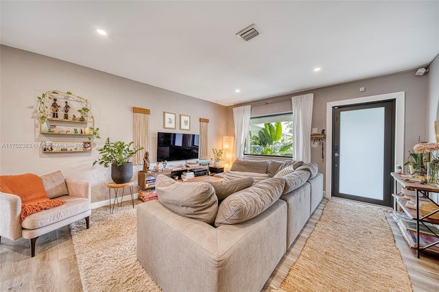 living room featuring light hardwood / wood-style floors