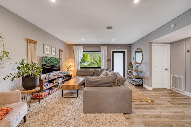 living room featuring light wood-type flooring