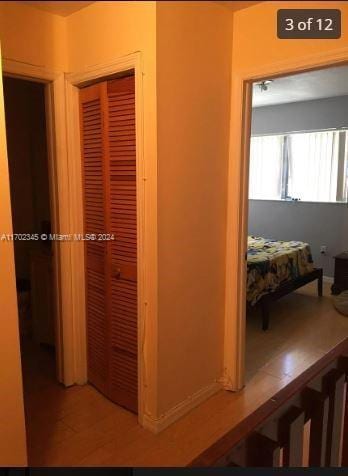 hallway featuring light tile patterned flooring