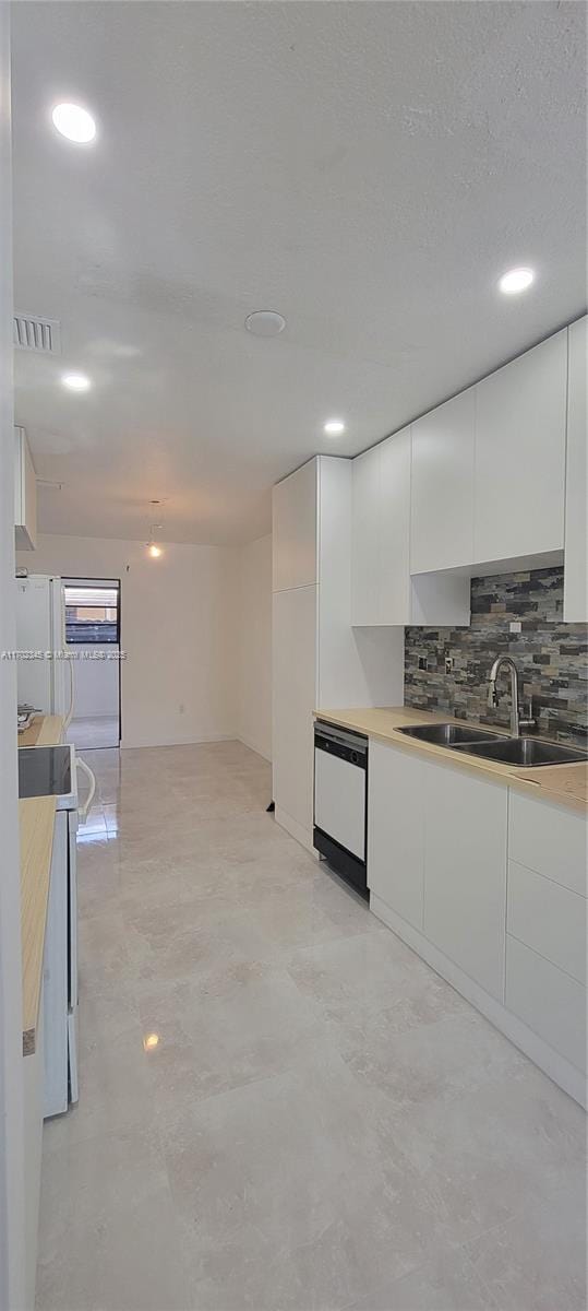 123 SW 113th Ave Unit 104-9, Sweetwater, FL 33174 - kitchen with dishwasher, white cabinets, modern cabinets, and a sink