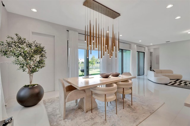 dining area with light tile patterned floors