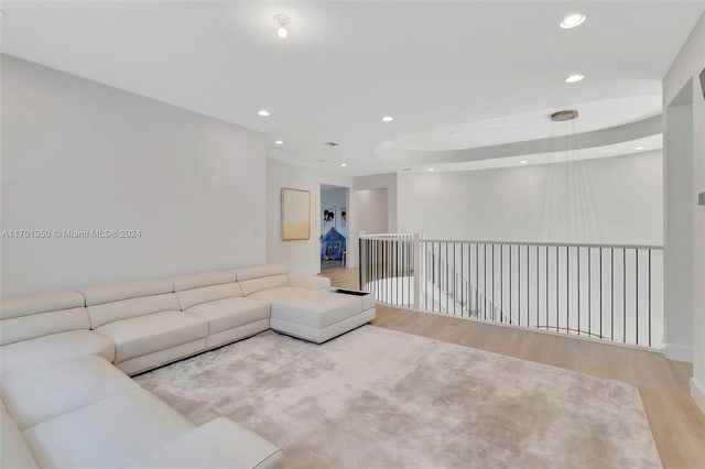 living room with light hardwood / wood-style flooring