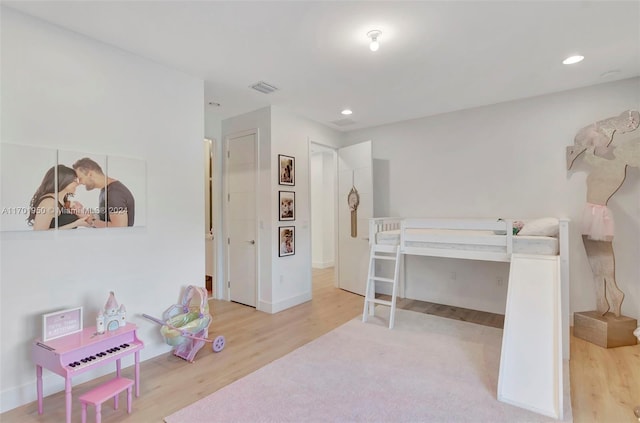 bedroom featuring light hardwood / wood-style floors