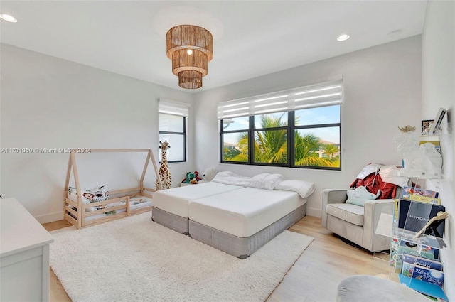 bedroom with light wood-type flooring