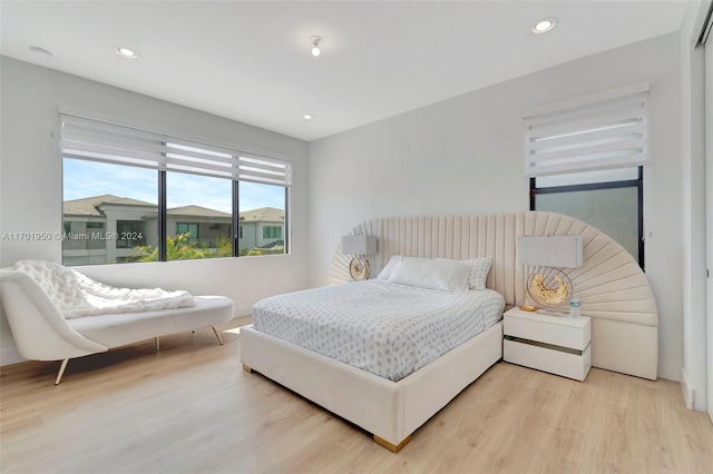 bedroom featuring light wood-type flooring