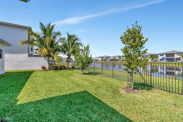 view of yard with a water view