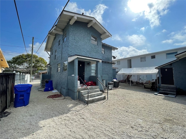236 SW 10th Ave, Miami, FL 33130 - back of house featuring entry steps and stucco siding