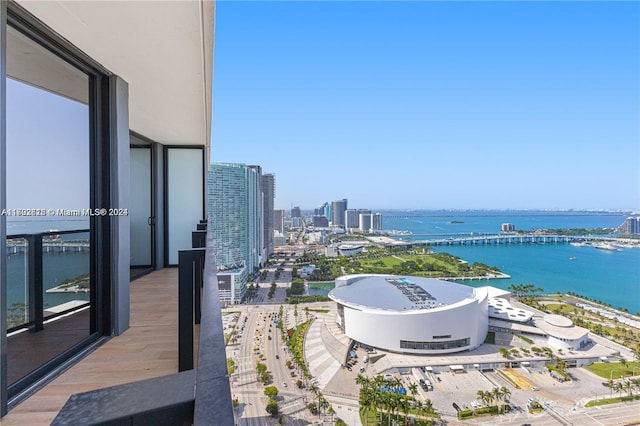 balcony featuring a water view