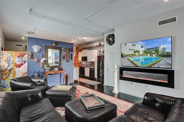 living room with hardwood / wood-style flooring