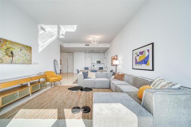 living room featuring tile patterned flooring