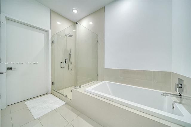 bathroom with plus walk in shower and tile patterned floors