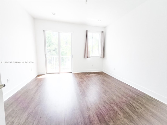 empty room featuring hardwood / wood-style floors