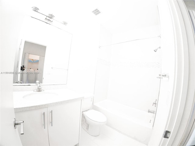 full bathroom with tile patterned flooring, toilet, vanity, and washtub / shower combination