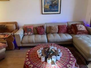 living room with wood-type flooring