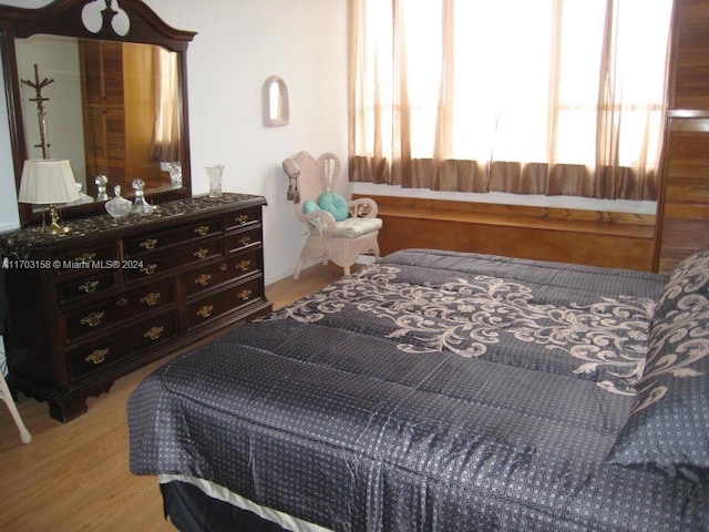 bedroom with light hardwood / wood-style flooring