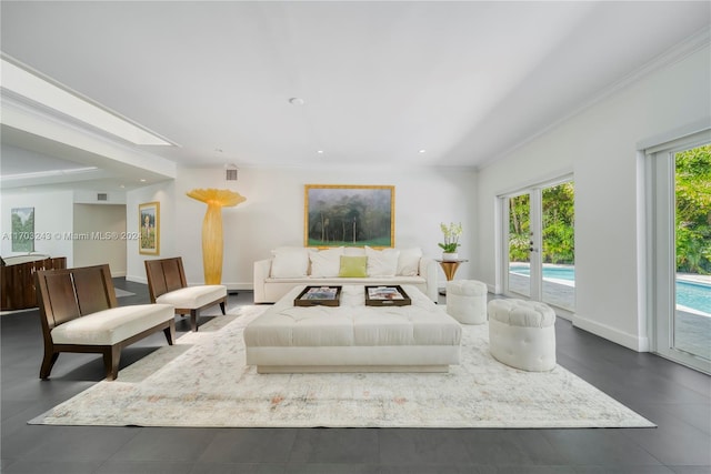 living room with french doors and ornamental molding