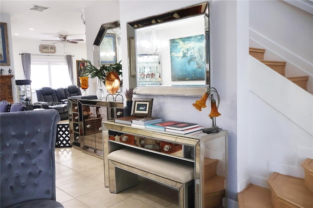 dining area with stairs, visible vents, ceiling fan, and light tile patterned floors