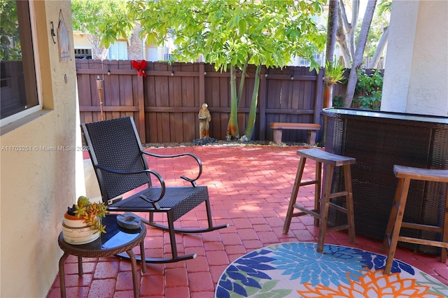 view of patio / terrace with fence