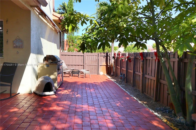 view of patio with a fenced backyard