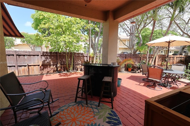 8778 SW 222nd Ter, Cutler Bay, FL 33190 - wooden terrace featuring outdoor dining space and a patio