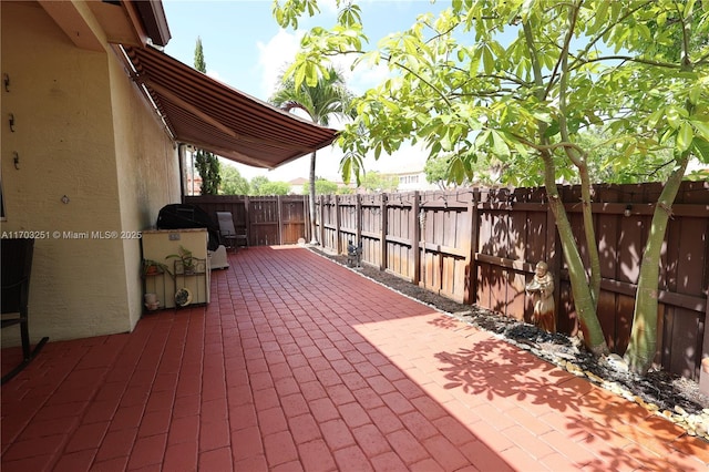 8778 SW 222nd Ter, Cutler Bay, FL 33190 - fenced backyard featuring a patio and area for grilling