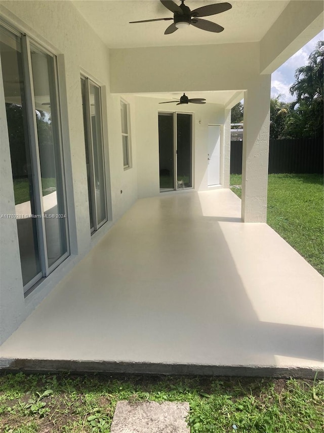 view of patio with ceiling fan