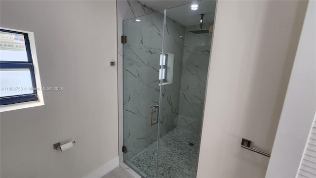 bathroom featuring an enclosed shower