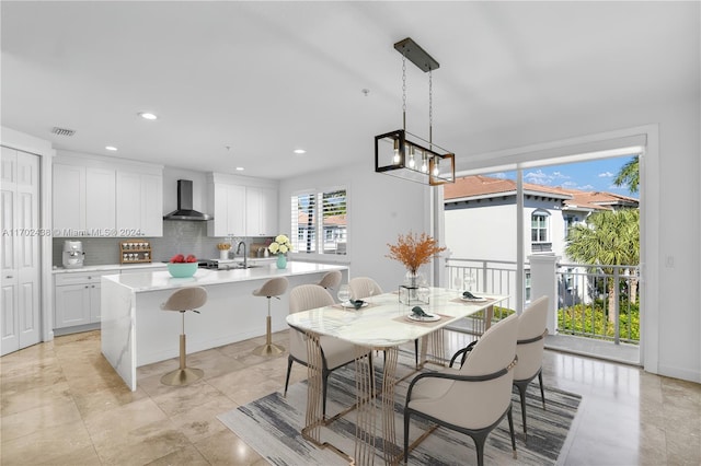 dining space with sink