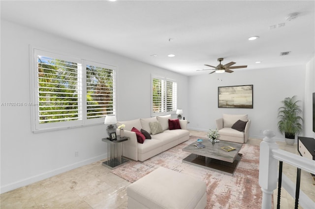 living room featuring ceiling fan