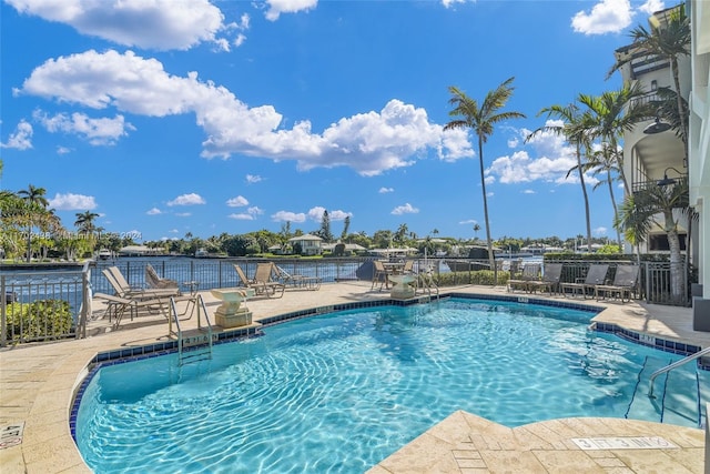 view of swimming pool with a patio