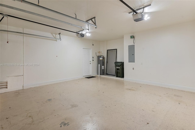 garage featuring electric panel, a garage door opener, and water heater