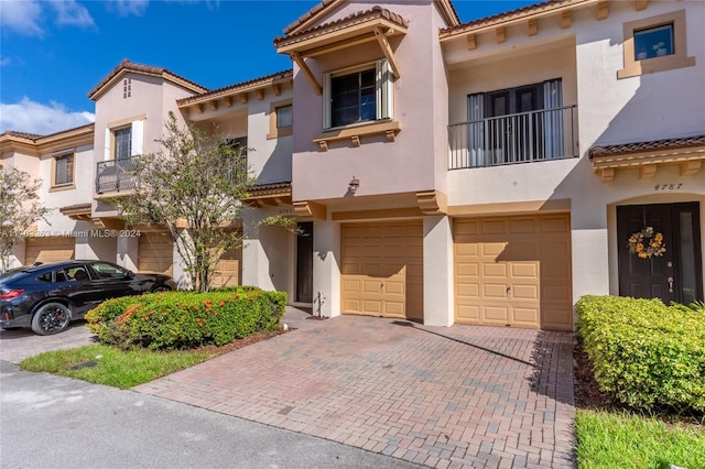 view of front of property with a garage