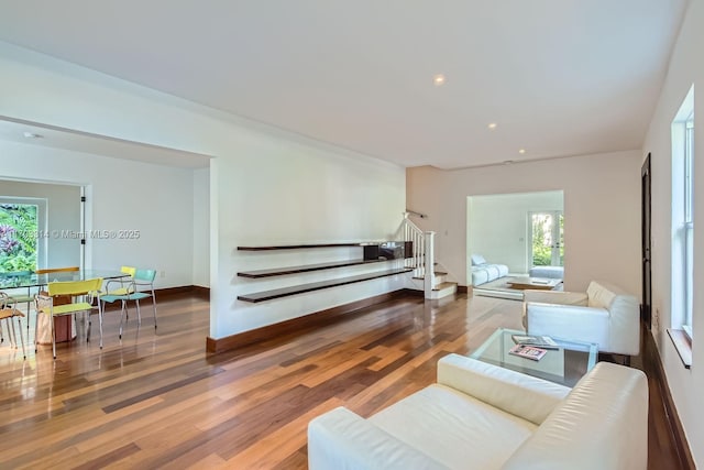 living room featuring hardwood / wood-style floors and plenty of natural light