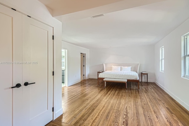 bedroom featuring light wood-type flooring