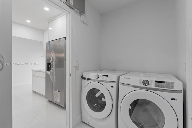 laundry room with independent washer and dryer