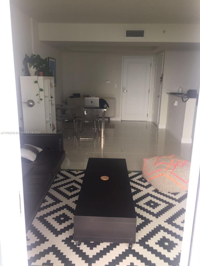 living room featuring tile patterned flooring