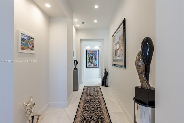 1410 Shadow Meadow Ln, Deland, FL 32724 - hall featuring recessed lighting, light marble finish floors, and baseboards