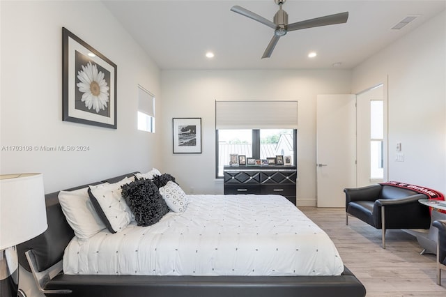 1410 Shadow Meadow Ln, Deland, FL 32724 - bedroom featuring multiple windows, recessed lighting, wood finished floors, and ceiling fan