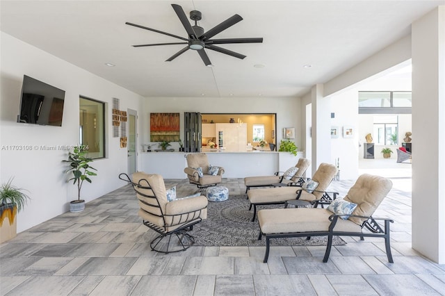 living room featuring ceiling fan