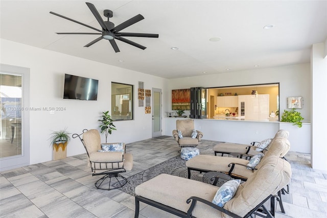 living room featuring ceiling fan