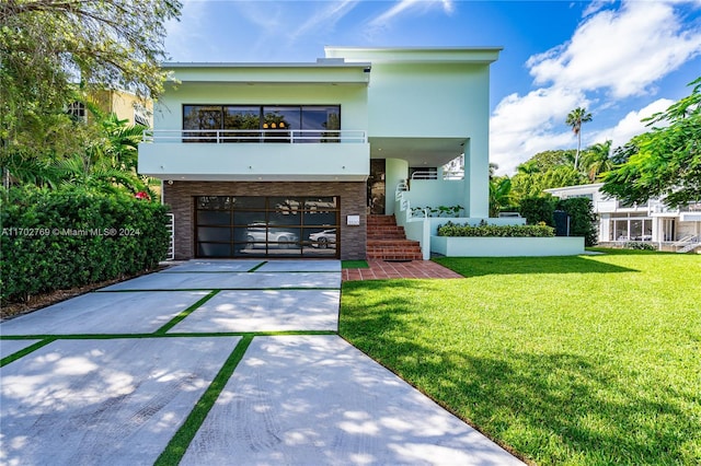 view of front of house featuring a balcony and a front lawn