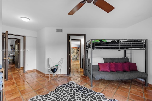 bedroom featuring ceiling fan