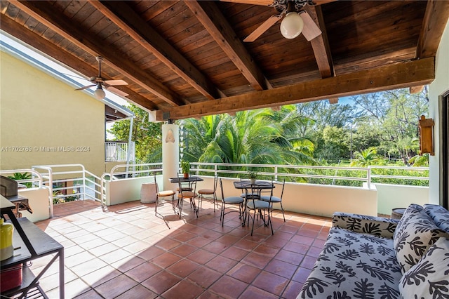 view of patio / terrace featuring a balcony and ceiling fan