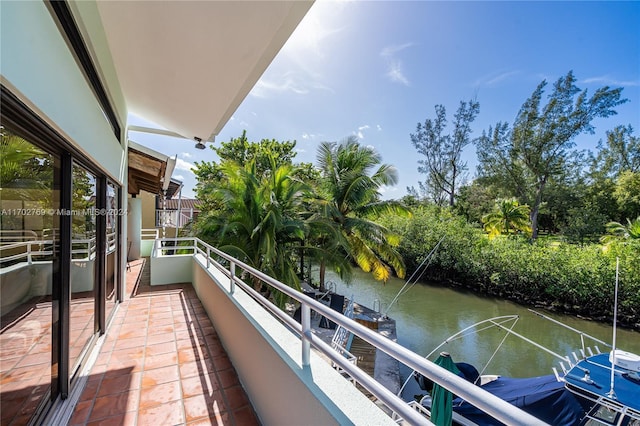 balcony featuring a water view