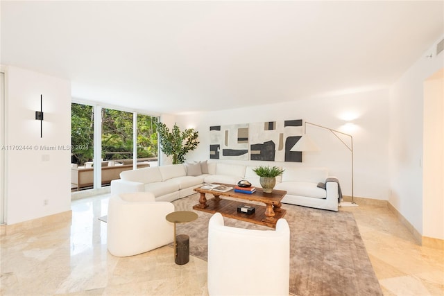 living room with a wall of windows