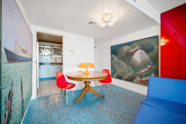 dining area featuring sink