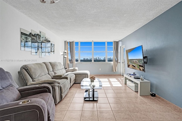 tiled living room featuring a textured ceiling