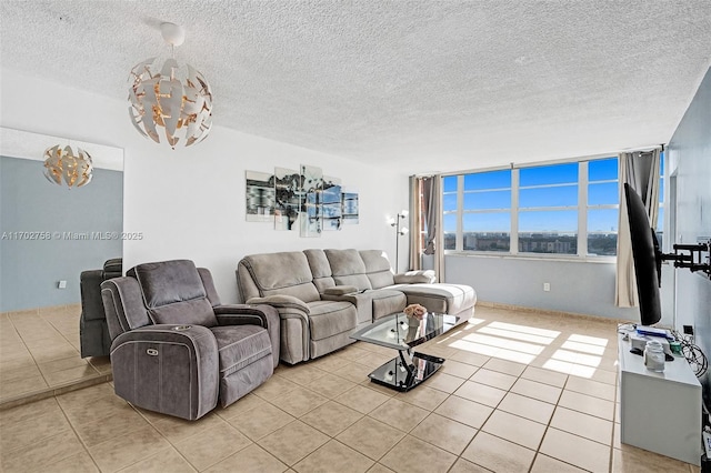 living room featuring a textured ceiling and light tile patterned flooring