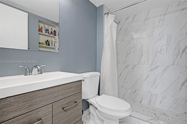 bathroom featuring walk in shower, vanity, and toilet