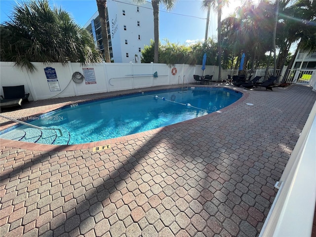 view of pool with a patio area